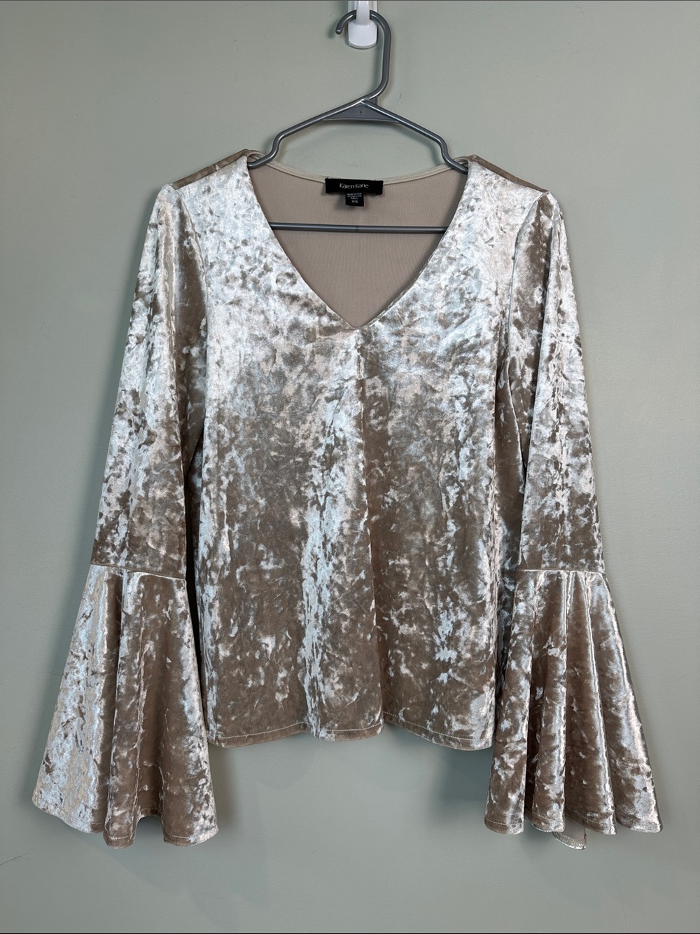 35. Karen Kane crushed velvet bell sleeve top.